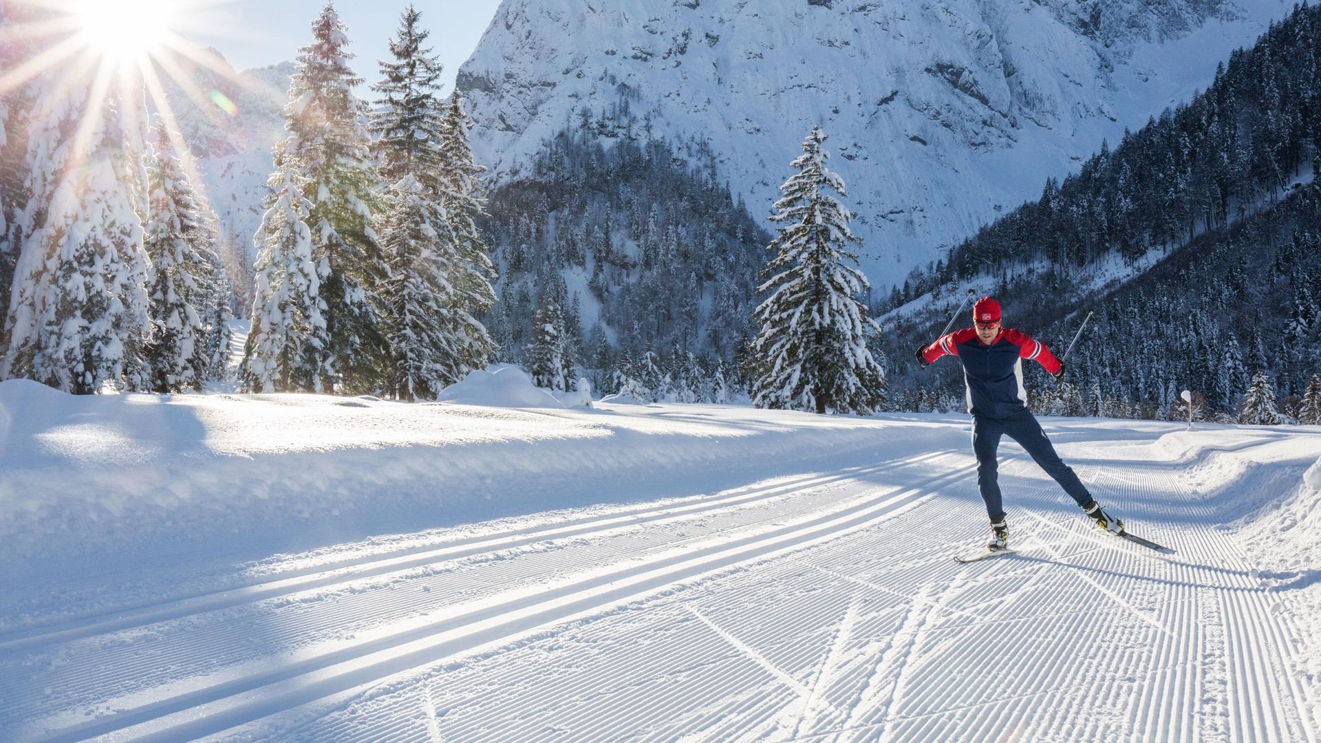 Cross-country skiing in a winter landscape near the hotel in Maurach 